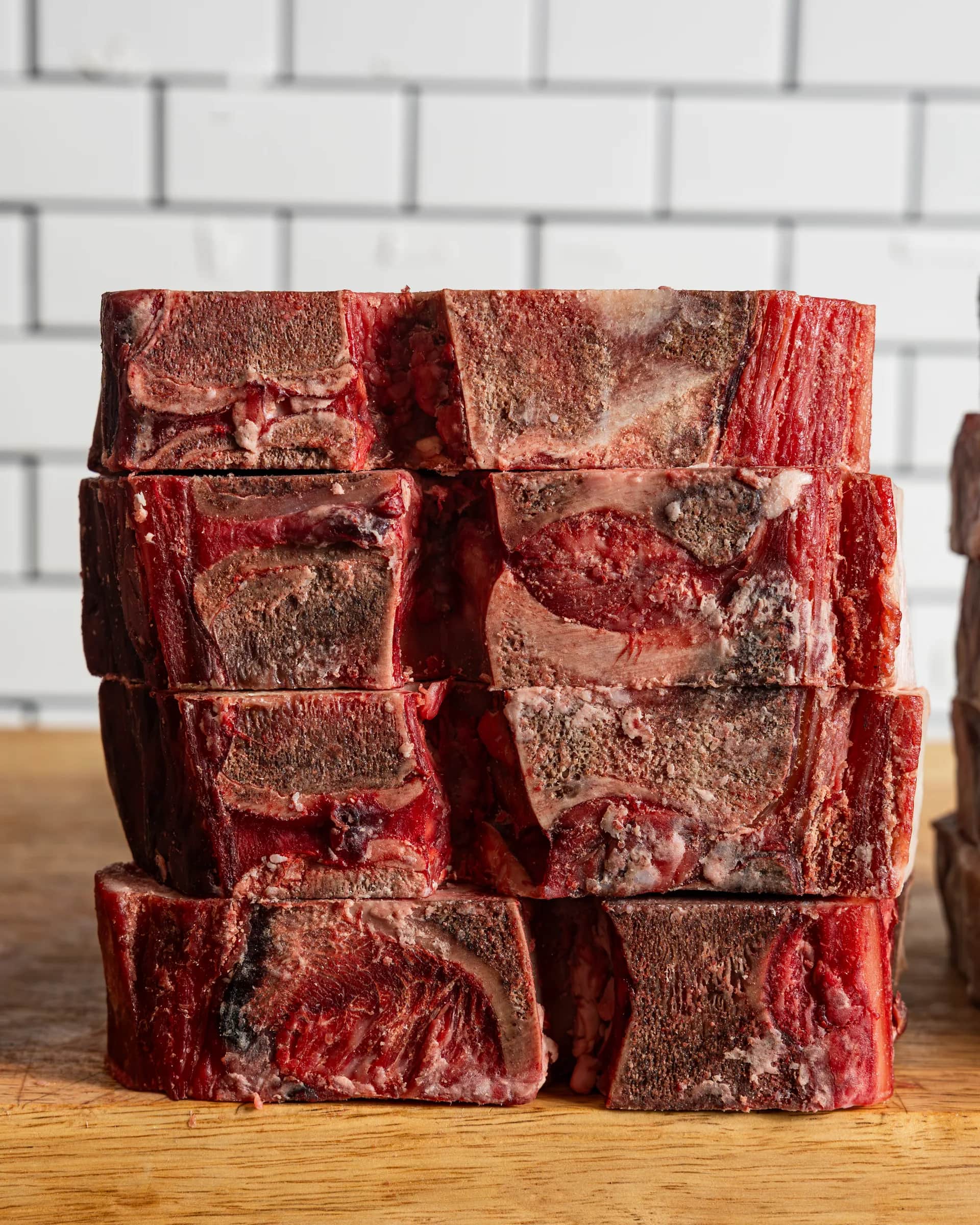 Stack of USDA Prime bone-in short rib, cut to length