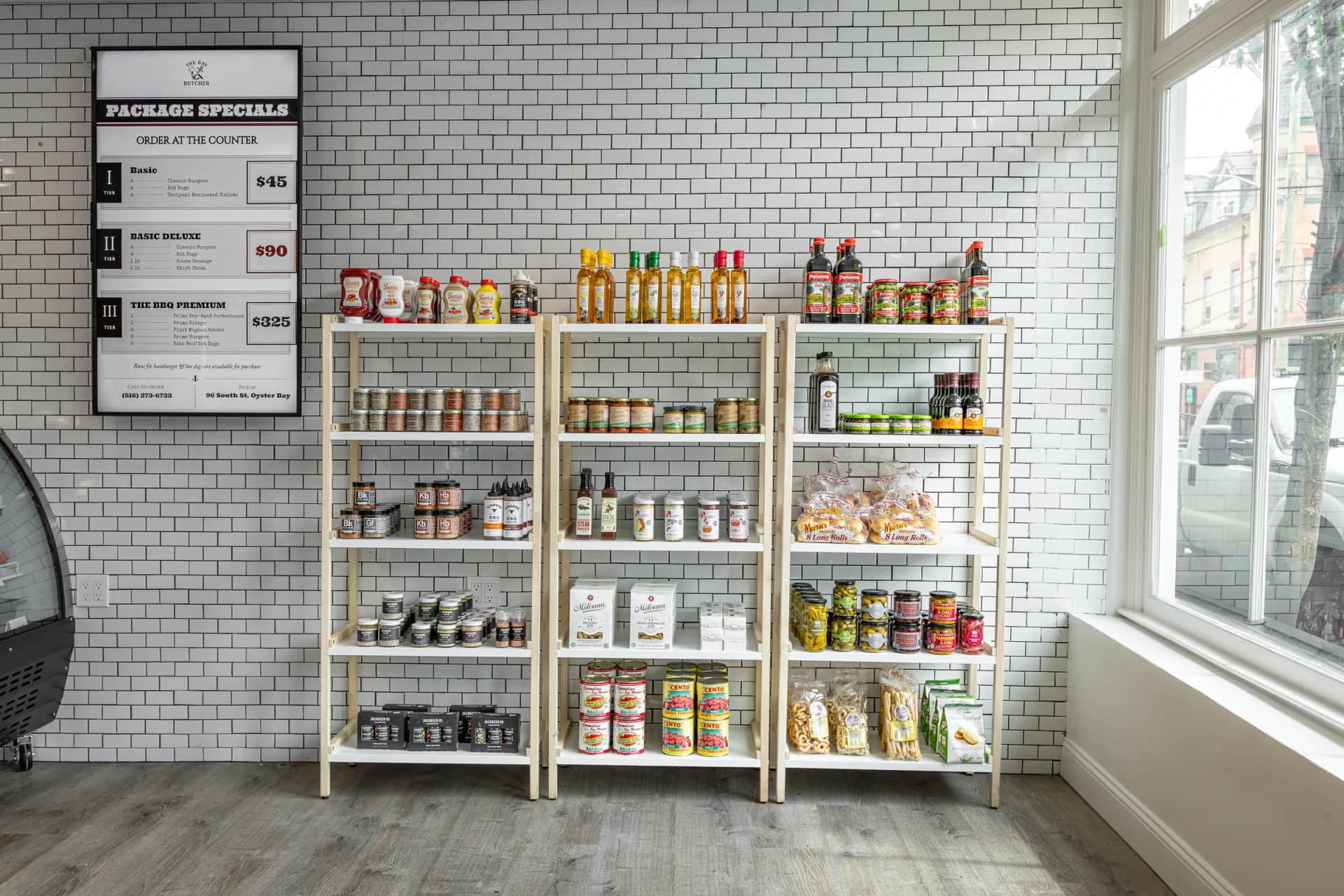Package Specials board with the pantry shelves behind