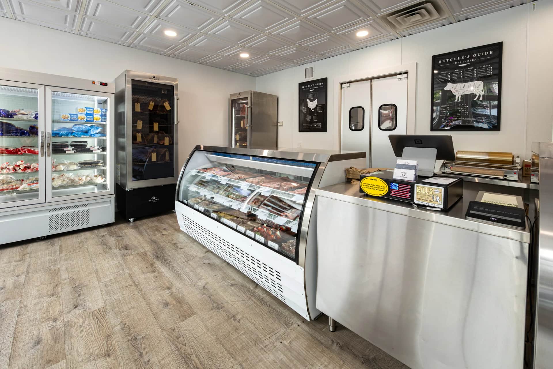 Shop interior with the butcher case and wall art