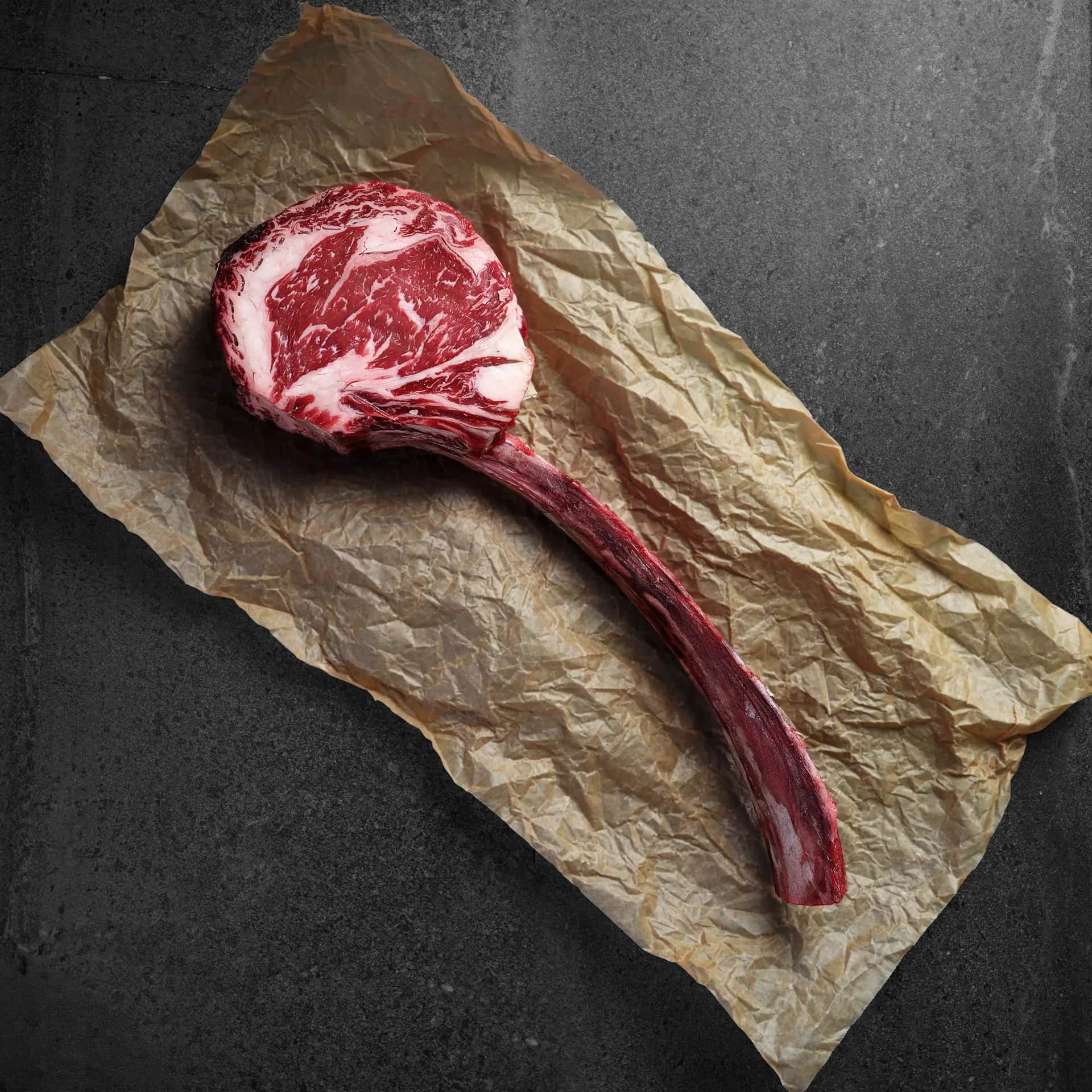 Long-Bone Ribeye — USDA Prime · dry-aged at The Bay Butcher, Oyster Bay, NY